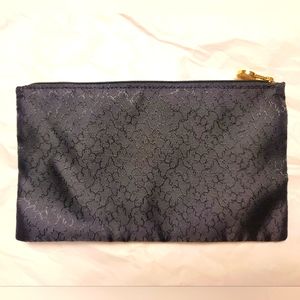 TOUS Clasica toiletry bag in nylon.